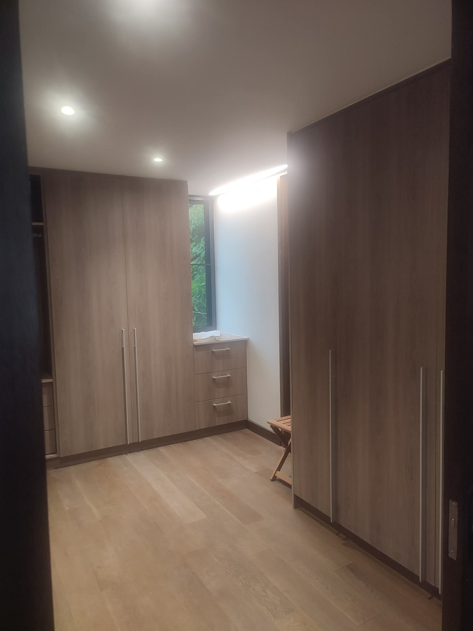 Blue kitchen with white backsplash